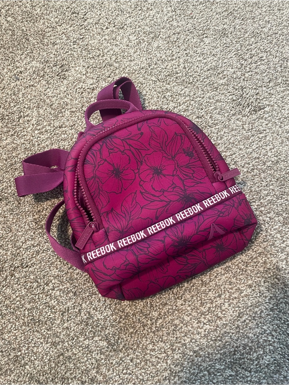 Reebok Mini Floral Backpack in Magenta